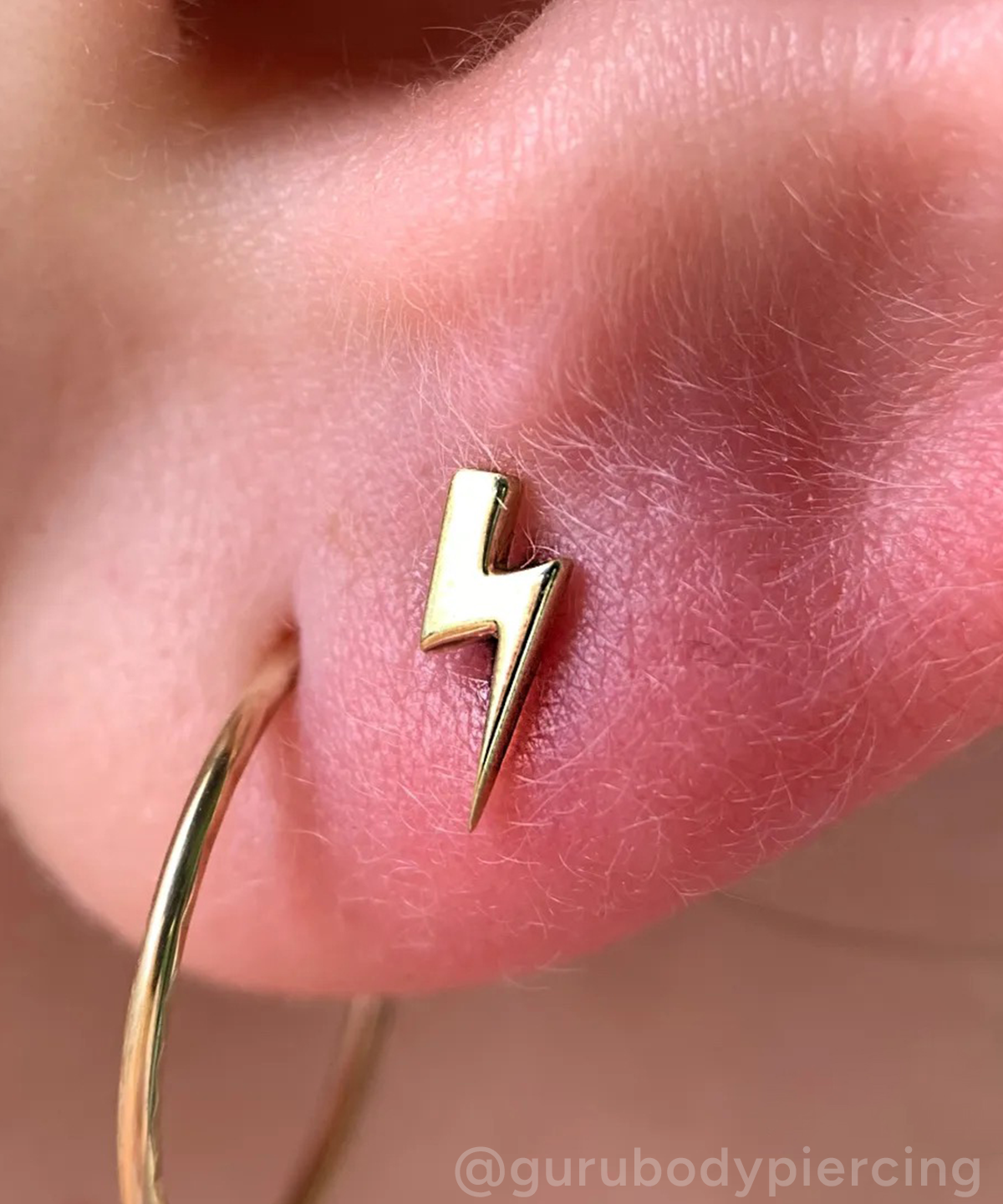 Lightning end in lobe piercing